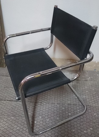 Krzesło skórzane obicie metalowa konstrukcja